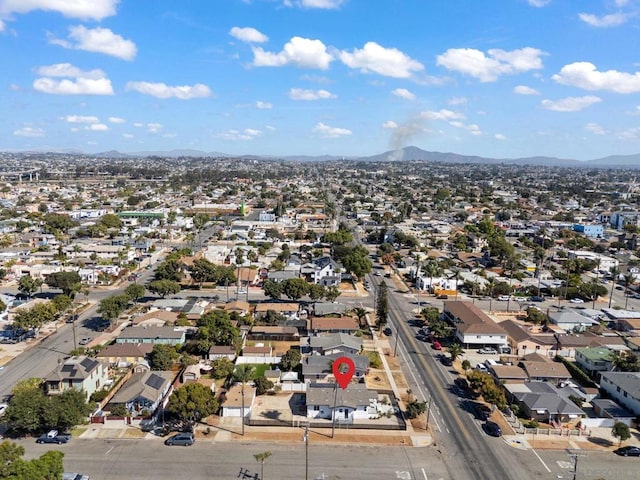 drone / aerial view featuring a mountain view