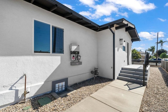 view of home's exterior featuring a deck