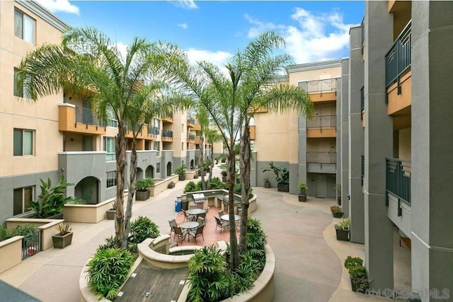 view of community with a patio area