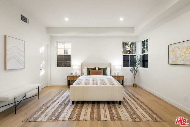 bedroom with light wood-type flooring