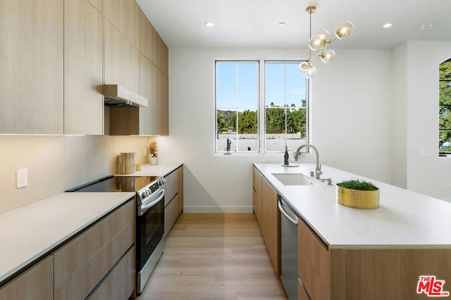 kitchen with ventilation hood, sink, hanging light fixtures, light brown cabinetry, and stainless steel appliances