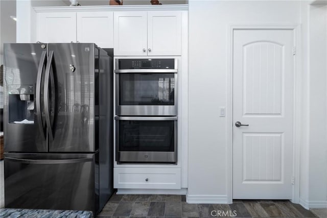 kitchen with white cabinets and stainless steel appliances