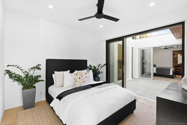 bedroom featuring ceiling fan and light wood-type flooring