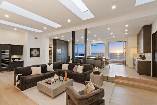 living room with light hardwood / wood-style floors