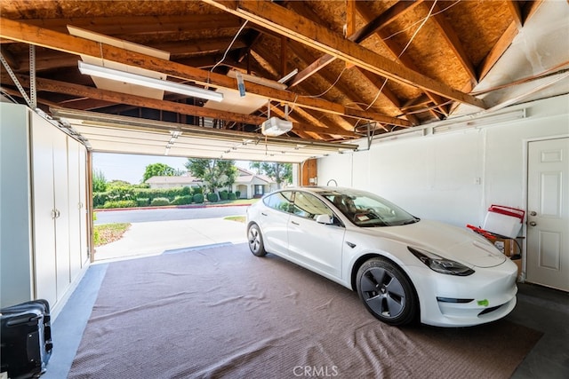 garage featuring a garage door opener