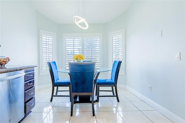 dining space with light tile patterned floors