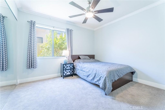 bedroom with light carpet, ceiling fan, and crown molding