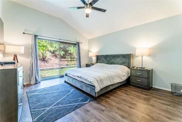 bedroom with ceiling fan, access to exterior, wood-type flooring, and lofted ceiling