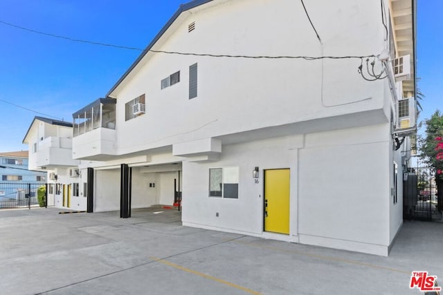 view of property exterior with a patio