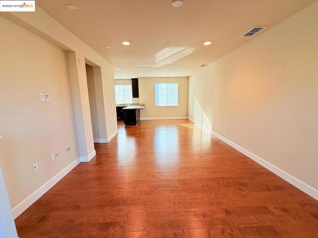 interior space with hardwood / wood-style floors