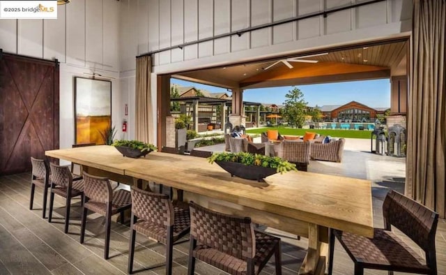 dining room featuring a barn door