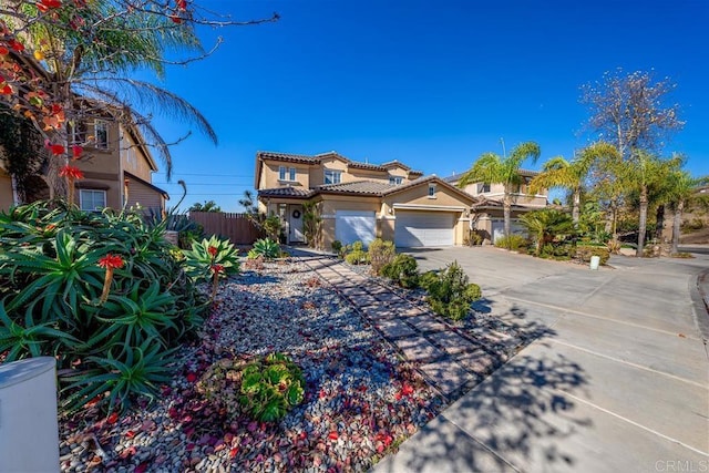 mediterranean / spanish-style house featuring a garage