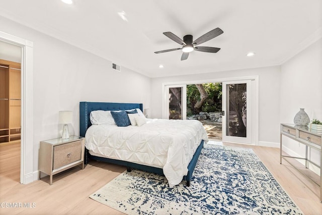 bedroom with ceiling fan, light hardwood / wood-style flooring, and access to outside