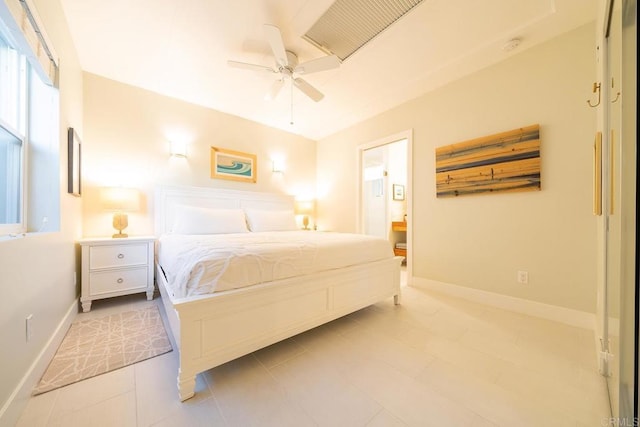 bedroom featuring connected bathroom and ceiling fan