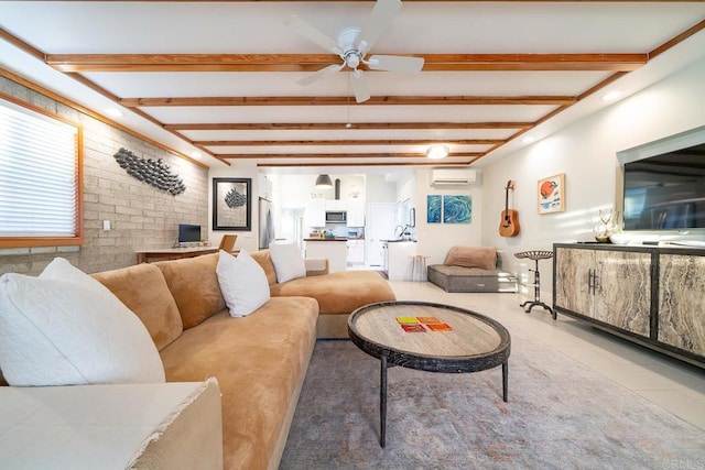 tiled living room featuring beamed ceiling, ceiling fan, a wall mounted air conditioner, and brick wall