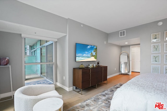 bedroom featuring light wood-type flooring