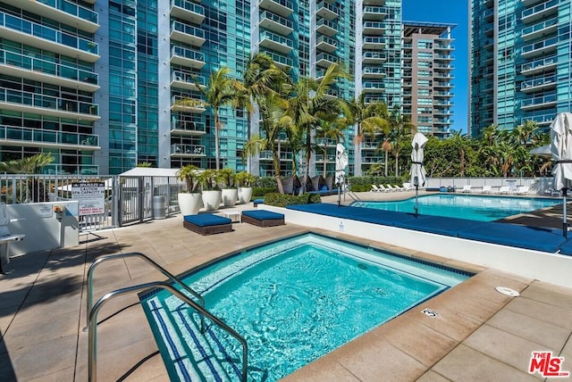 view of swimming pool featuring a patio