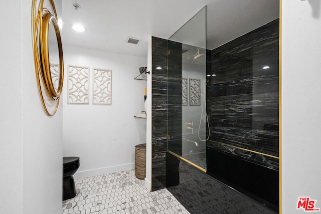 bathroom with tile patterned flooring, a shower, and toilet