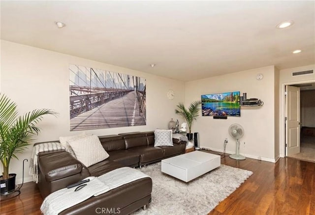 living room featuring dark hardwood / wood-style flooring