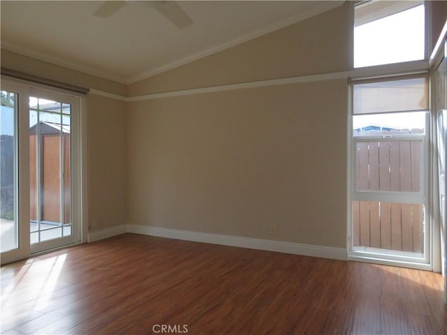 unfurnished room with wood-type flooring, vaulted ceiling, ceiling fan, and crown molding