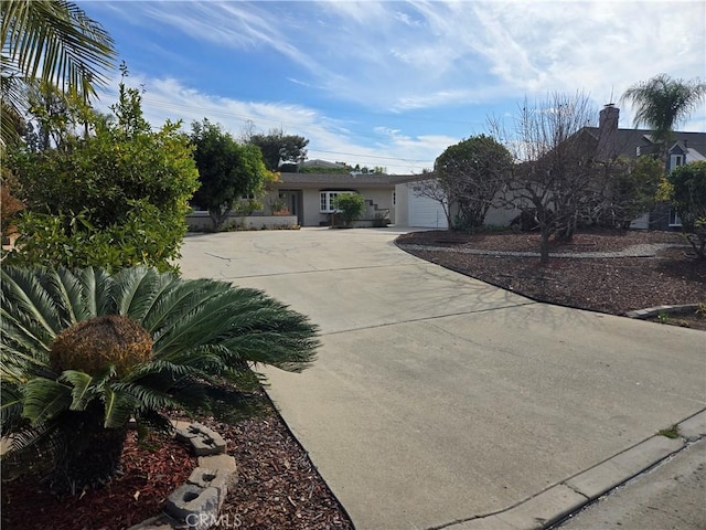 single story home featuring a garage