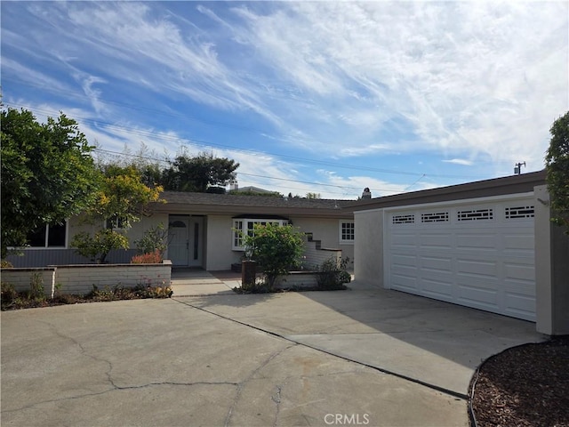 ranch-style house with a garage