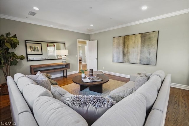 living area featuring dark wood-style floors, crown molding, and baseboards