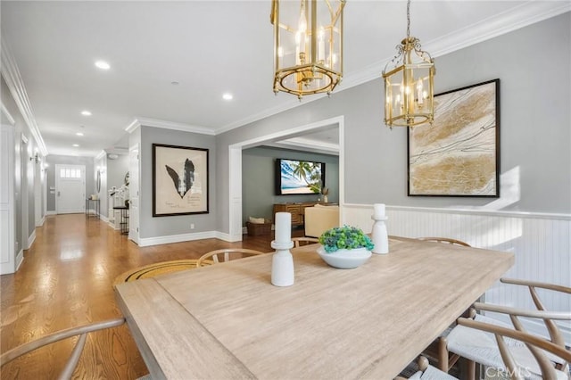 dining room with a healthy amount of sunlight, recessed lighting, and light wood-style floors