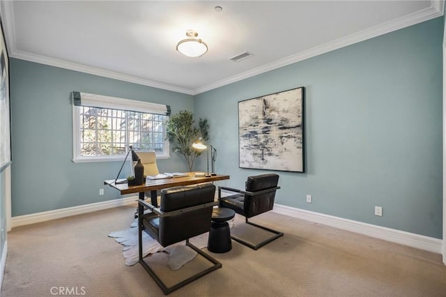 office area featuring baseboards, visible vents, ornamental molding, and light colored carpet