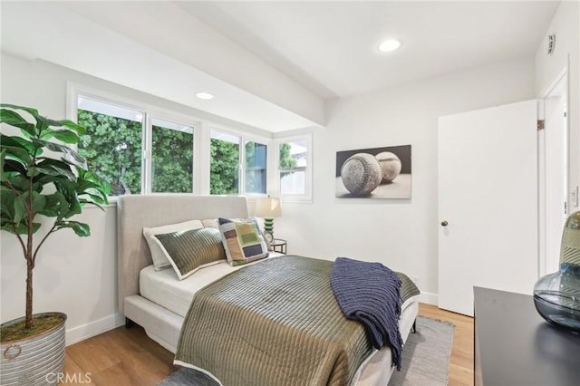 bedroom featuring hardwood / wood-style floors