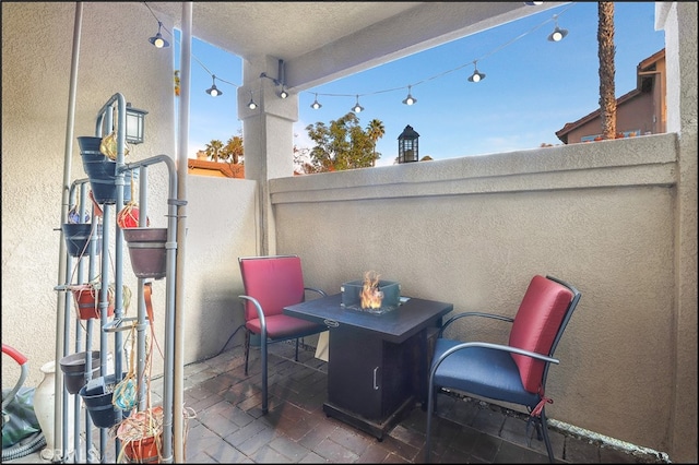 view of patio / terrace with a balcony