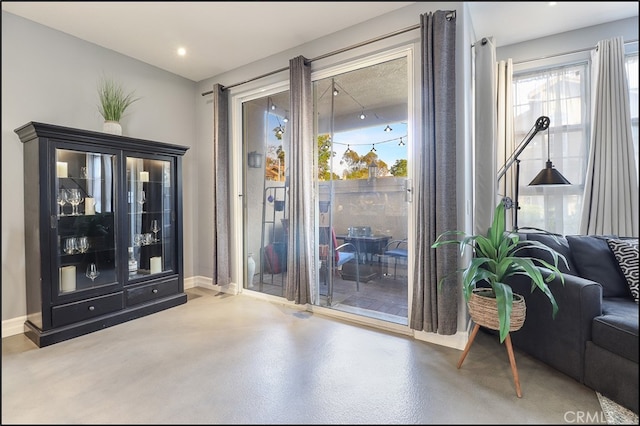 doorway featuring concrete flooring