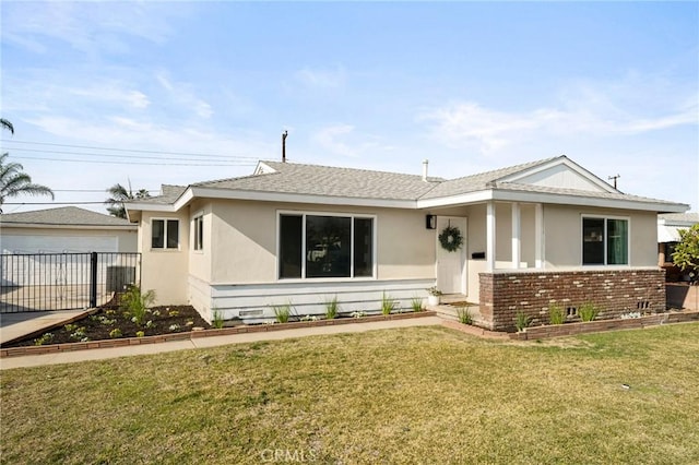 view of front facade with a front lawn