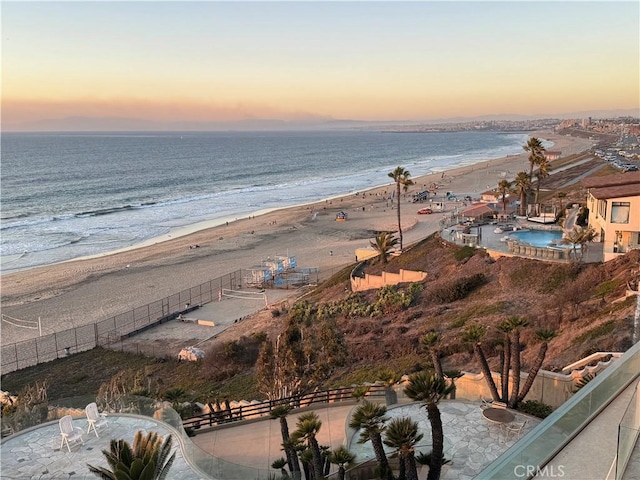 view of water feature with a beach view