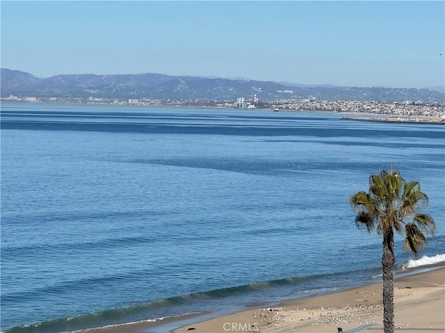 water view with a view of the beach and a mountain view