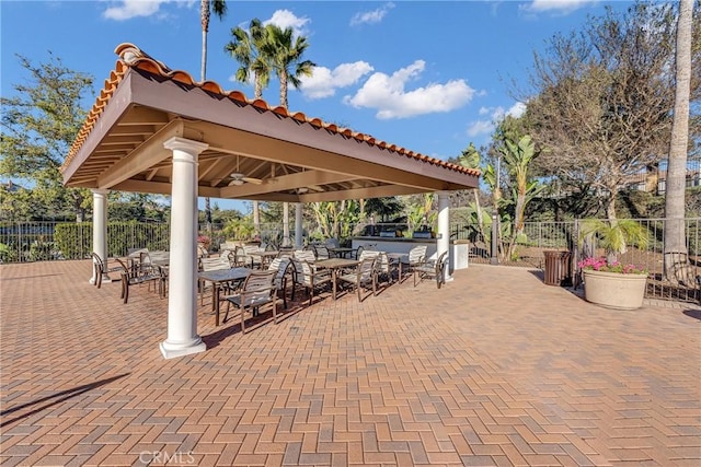 view of patio / terrace with a gazebo and an outdoor bar