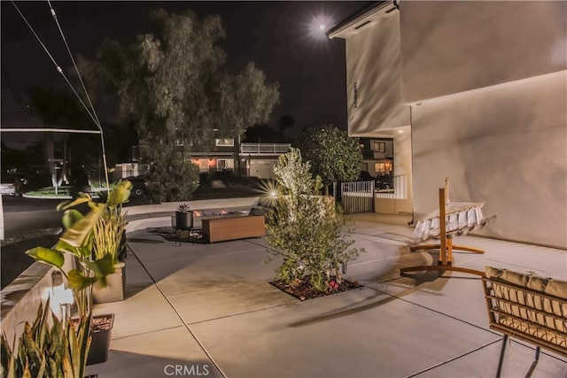 view of patio at twilight