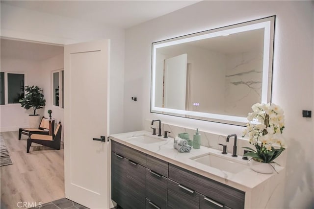 bathroom featuring tile patterned flooring and vanity