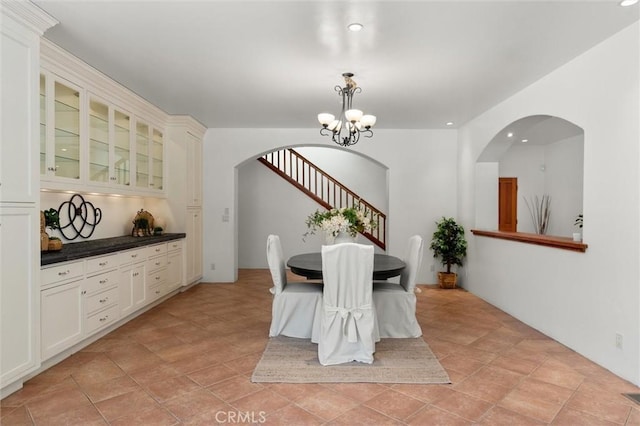 dining area featuring an inviting chandelier