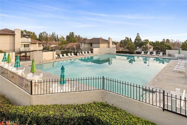 view of swimming pool featuring a patio