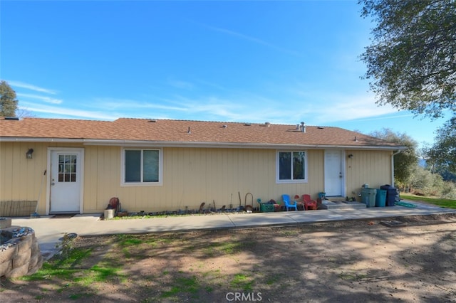 rear view of property with a patio area