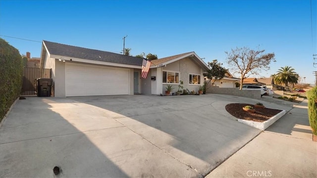 single story home featuring a garage