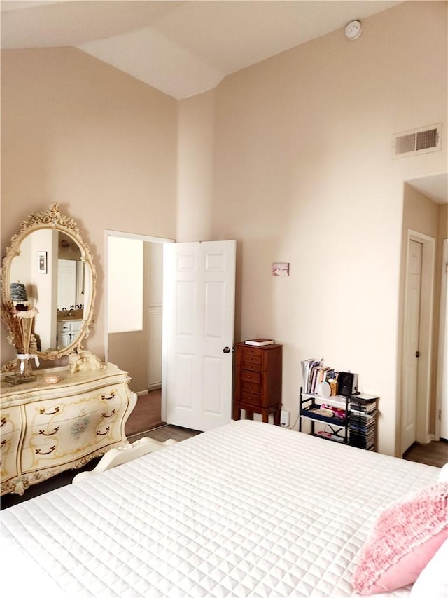 bedroom with vaulted ceiling