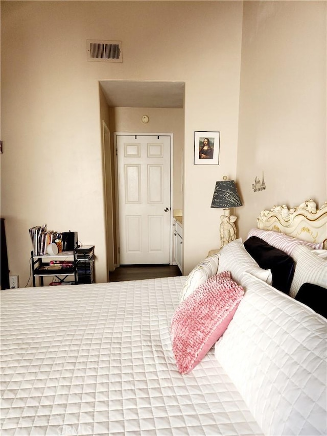 bedroom featuring ensuite bath