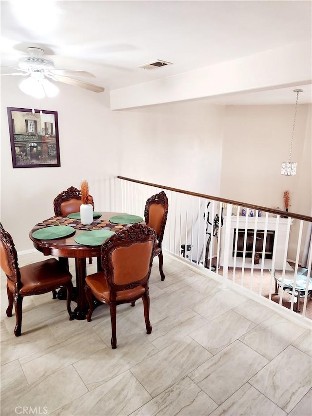 dining area featuring ceiling fan