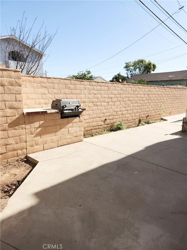 view of patio / terrace featuring a grill