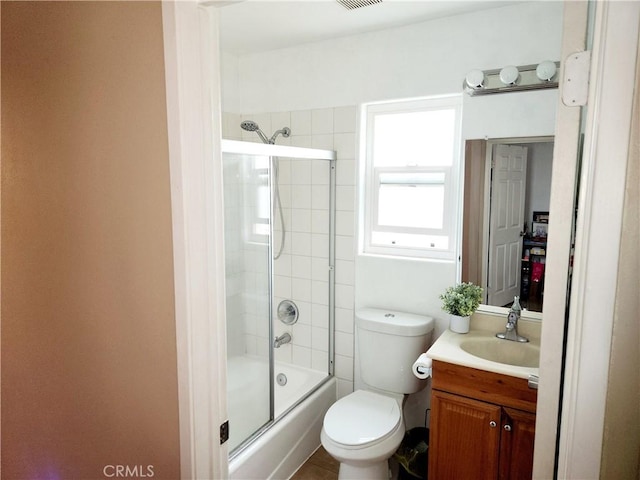 11608 Valley View Ave Unit 6, Whittier, CA 90604 - full bath featuring shower / bath combination with glass door, toilet, visible vents, and vanity