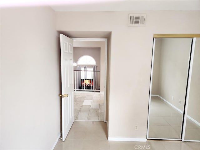 11608 Valley View Ave Unit 6, Whittier, CA 90604 - unfurnished bedroom featuring visible vents, baseboards, and light tile patterned flooring