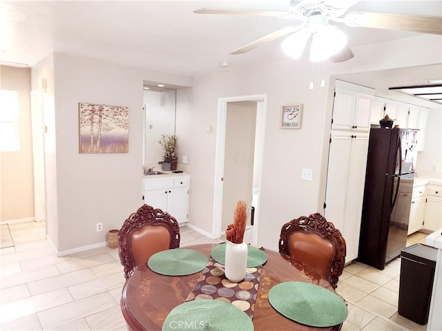 11608 Valley View Ave Unit 6, Whittier, CA 90604 - dining area with baseboards, a ceiling fan, and light tile patterned flooring