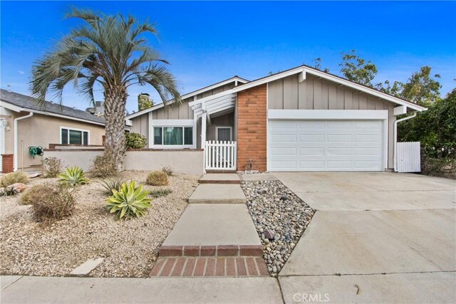 ranch-style home featuring a garage